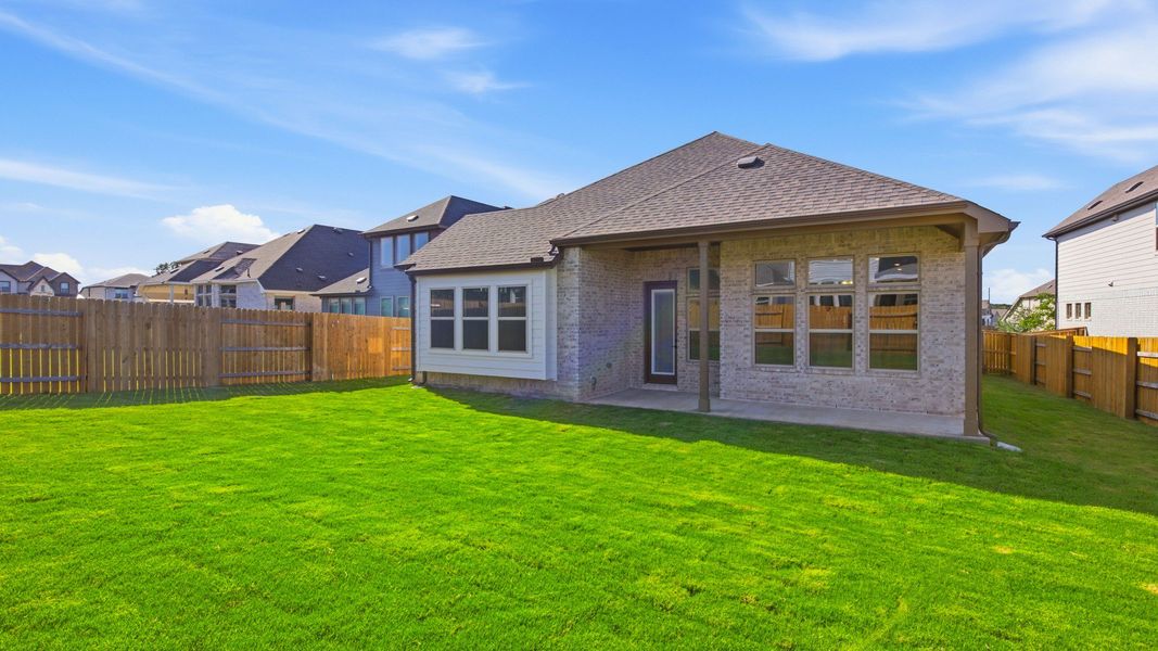 Exterior details and patio area of a home in Oaks at San Gabriel, Georgetown (Image 3).