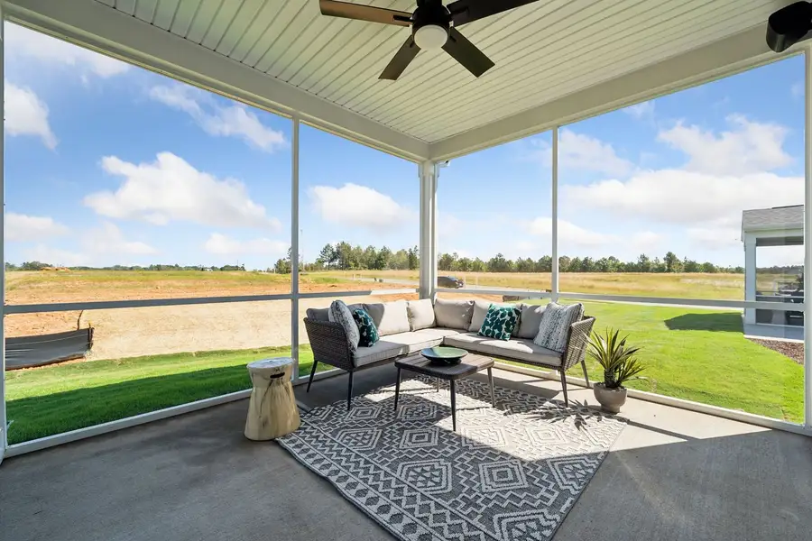 Exterior details and patio area of a home in The Beacon at Old Peachtree Single Family Homes, Lawrenceville (Image 88).