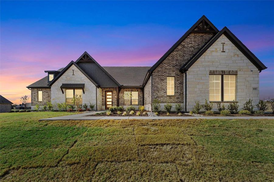 Front exterior of a new home in Creekview Addition, Van Alstyne, TX, highlighting curb appeal (Image 24). Front exterior of a new home in Creekview Addition, Van Alstyne, TX, highlighting curb appeal (Image 24).