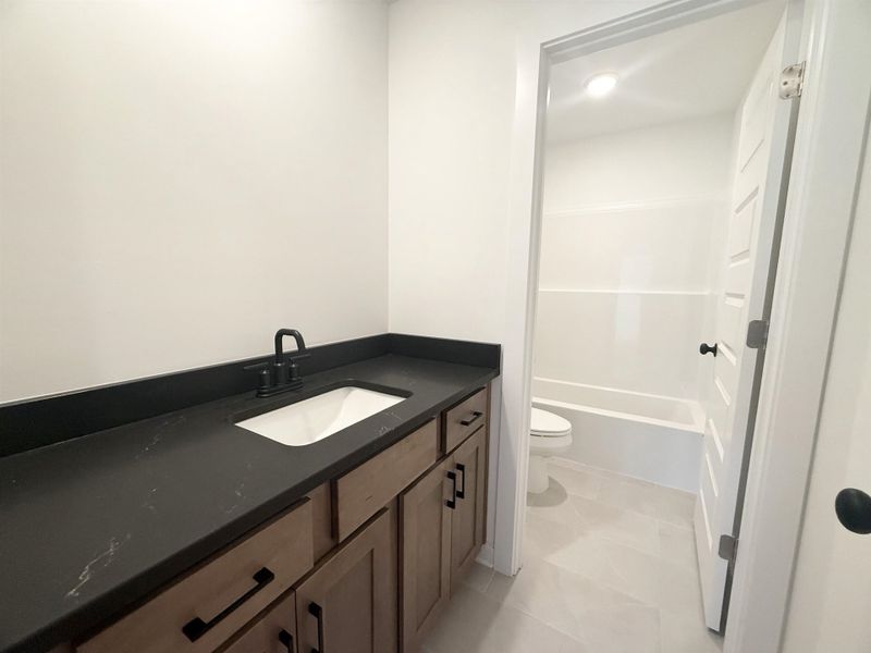 Bathroom with toilet and vanity