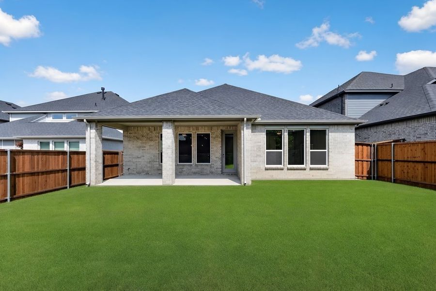 Exterior details and patio area of a home in South Oak, Lakewood Village (Image 3).