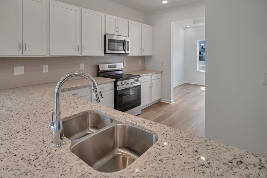 Close-up of interior finishes inside a home in Marlin Pointe, White House (Image 9).