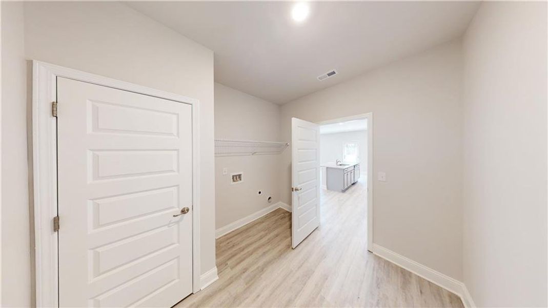 Spacious, unfurnished interior of a new home in Holliday Pass, Griffin (Image 18).