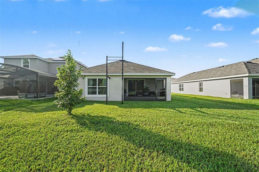Exterior details and patio area of a home in Summit View, Dade City (Image 23).