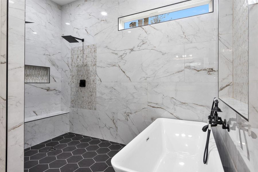 Surprise!!! This amazing shower and tub are all in one amazing and beautiful area giving it the true feel of a spa. This is a space you might just like to stay all day in at your very own private spa. Surprise!!! This amazing shower and tub are all in one amazing and beautiful area giving it the true feel of a spa. This is a space you might just like to stay all day in at your very own private spa.