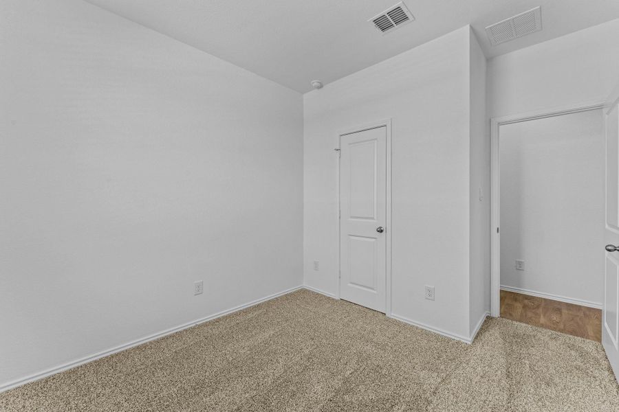 Spacious, unfurnished interior of a new home in Wayside, Uhland (Image 14).