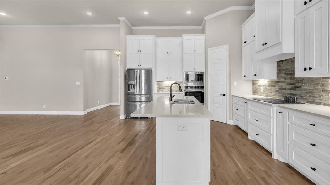 Furnished interior view inside a new home in Dry Creek East, Poolville (Image 13).