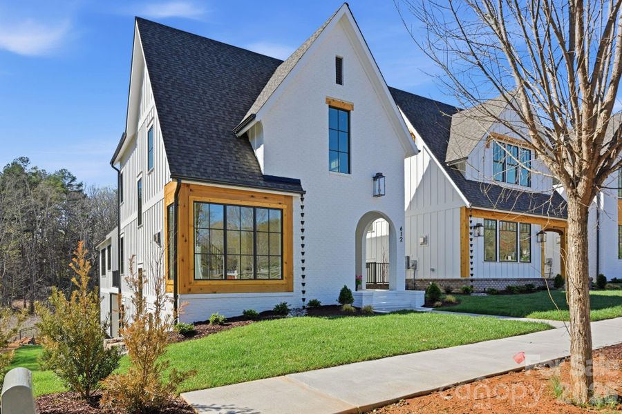 Front exterior of a new home in , Davidson, NC, highlighting curb appeal (Image 22).