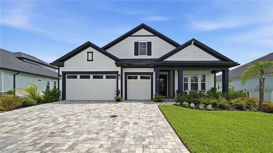 Front exterior of a new home in , St. Augustine, FL, highlighting curb appeal (Image 25).