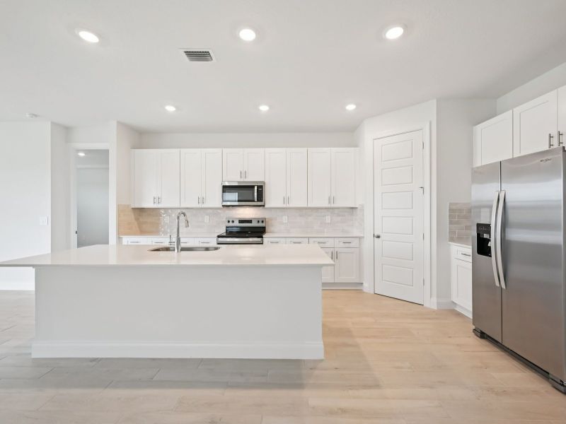 Furnished interior view inside a new home in Brystol at Wylder - Reserve Series, Port St. Lucie (Image 6).