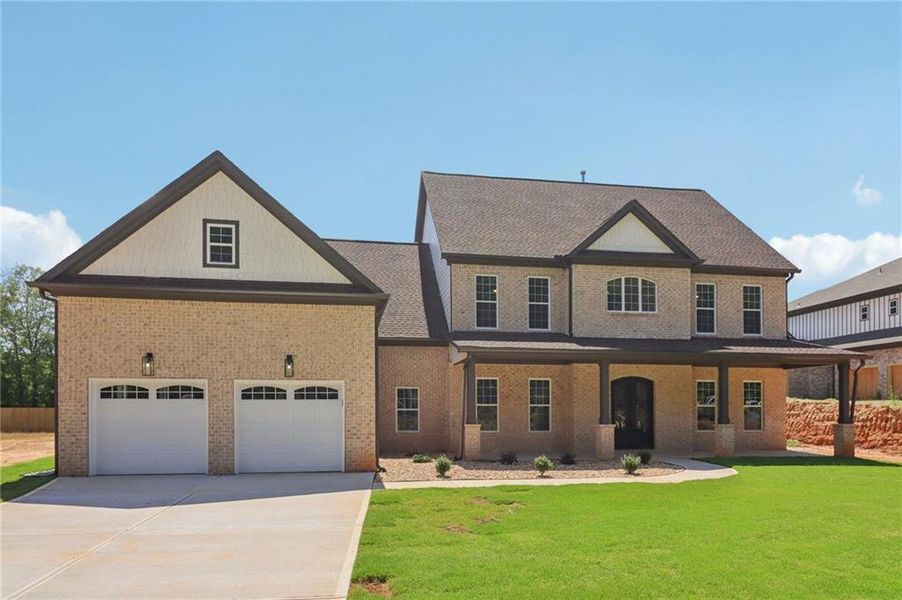 Front exterior of a new home in , Lilburn, GA, highlighting curb appeal (Image 30).