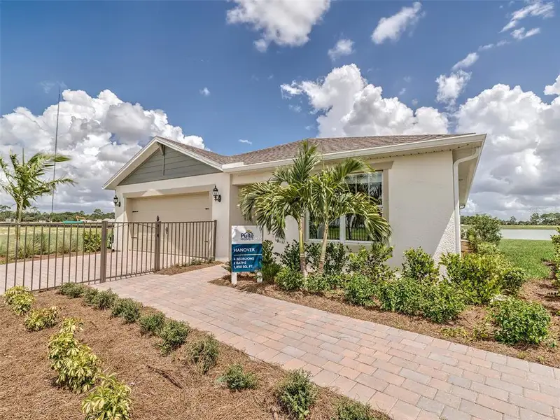 Exterior details and patio area of a home in Lakespur Wellen Park, Venice (Image 3).