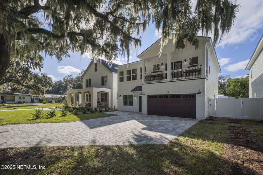 Front exterior of a new home in , St. Augustine, FL, highlighting curb appeal (Image 1).