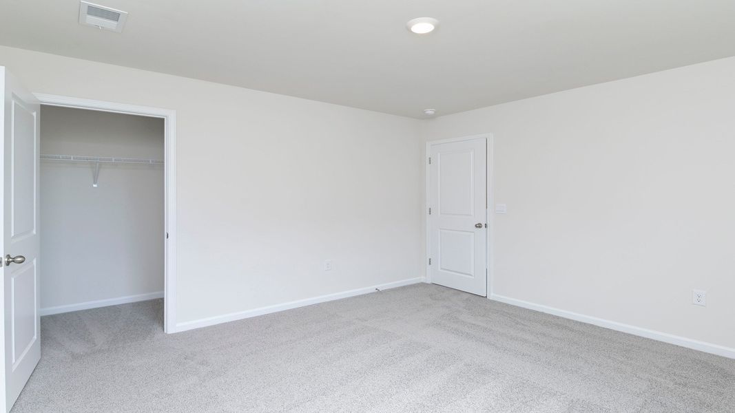 Spacious, unfurnished interior of a new home in Hunter's Branch, Hopkins (Image 24).