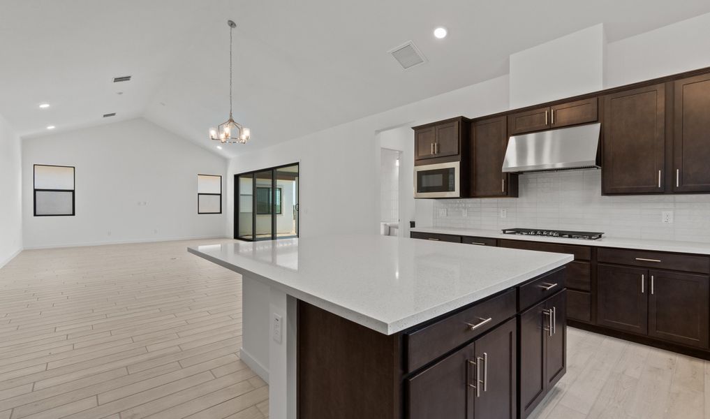 Kitchen with spacious central island Kitchen with spacious central island