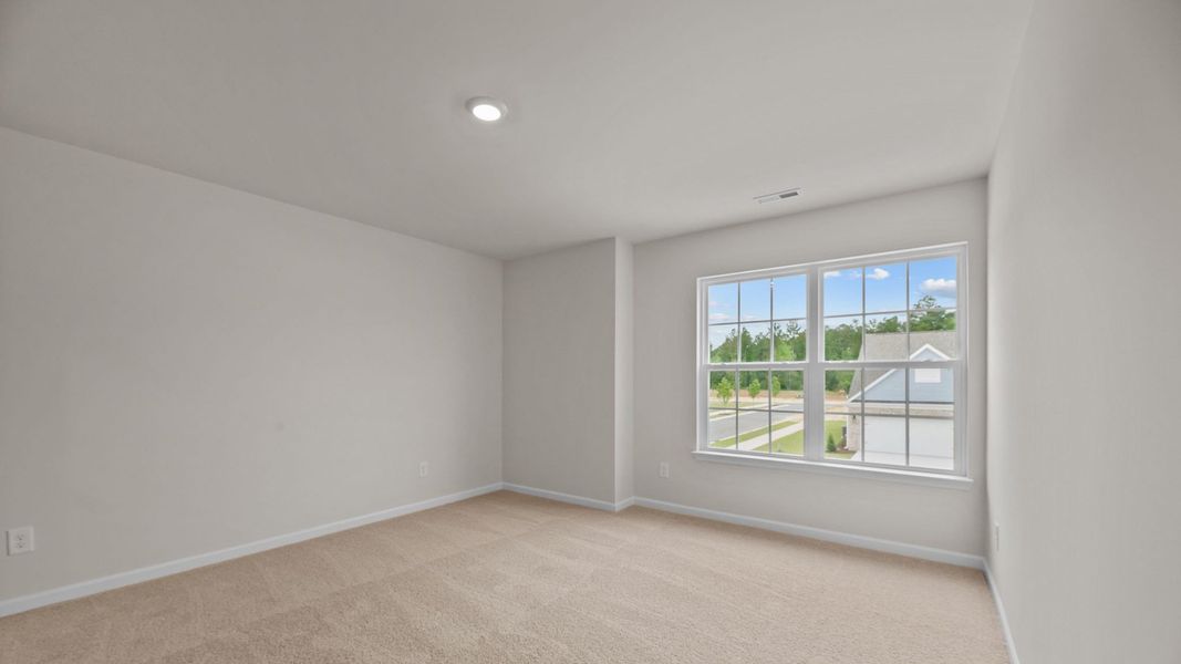 Spacious, unfurnished interior of a new home in West New Bern, New Bern (Image 30).