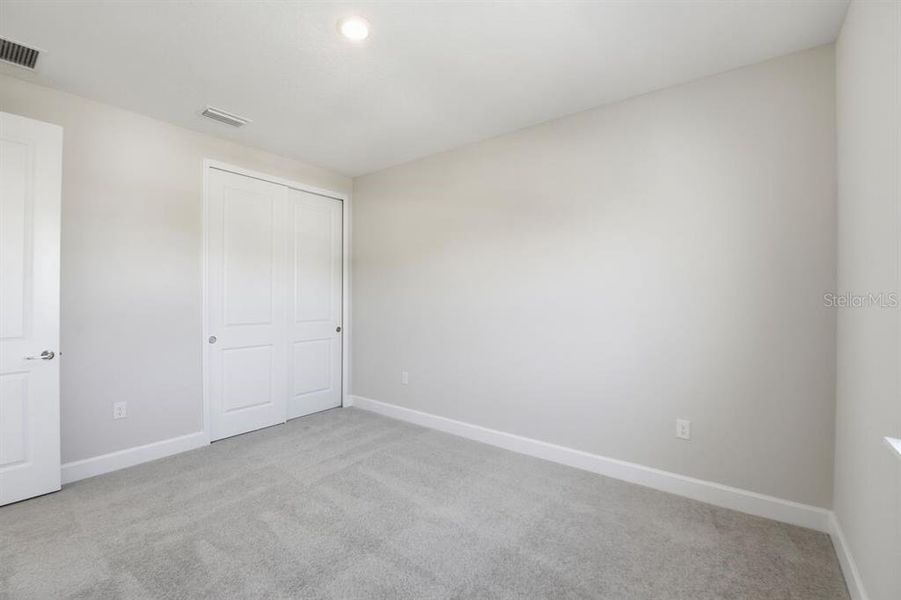 Spacious, unfurnished interior of a new home in Harvest at Ovation, Winter Garden (Image 28).