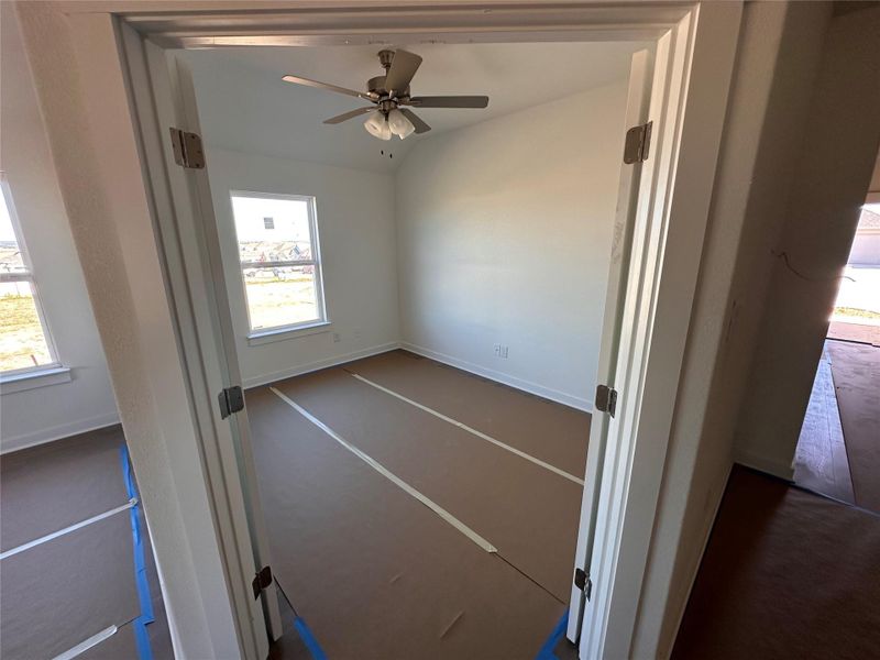 Unfurnished room featuring baseboards and ceiling fan Unfurnished room featuring baseboards and ceiling fan