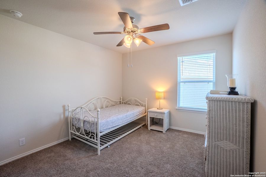 Furnished interior view inside a new home in The Links at River Bend, Floresville (Image 28).