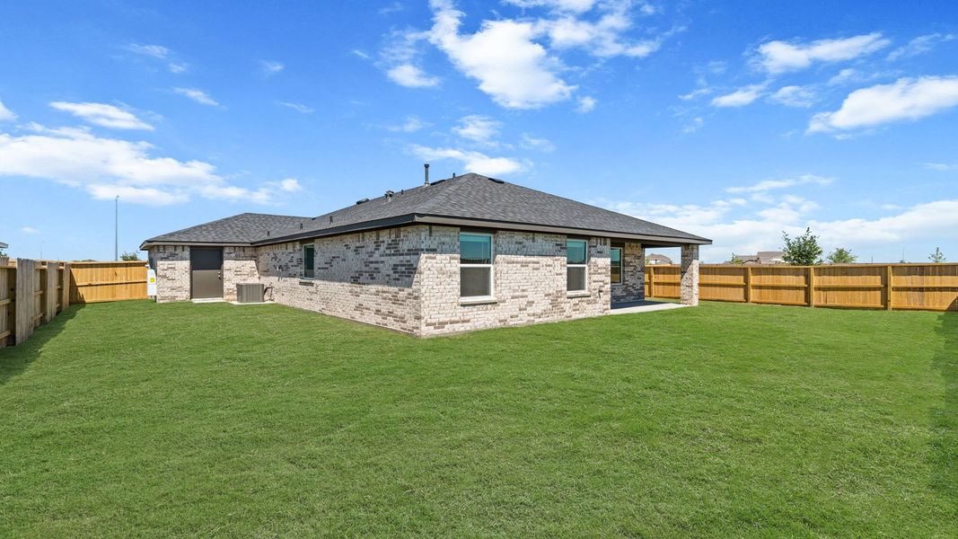 Exterior details and patio area of a home in Sunterra Lakes, Brookshire (Image 18). Exterior details and patio area of a home in Sunterra Lakes, Brookshire (Image 18).