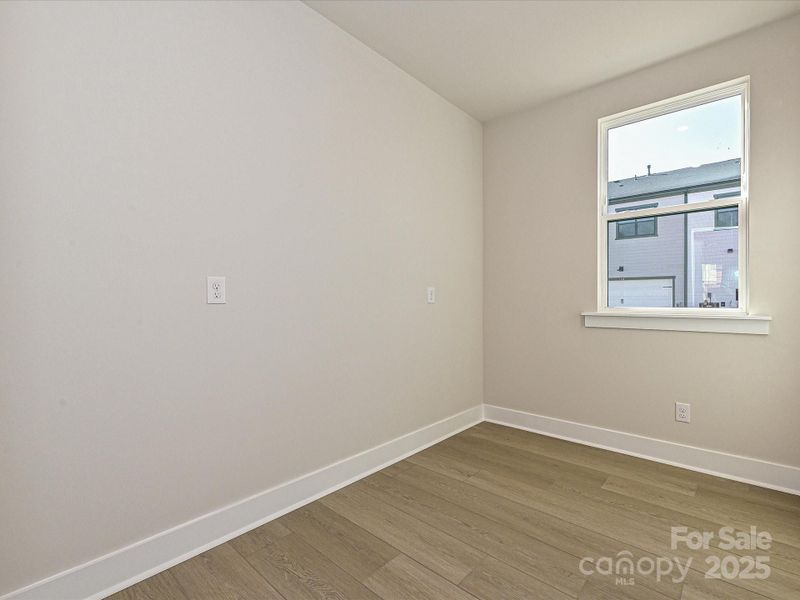 First floor flex space perfect for a home office or gym.