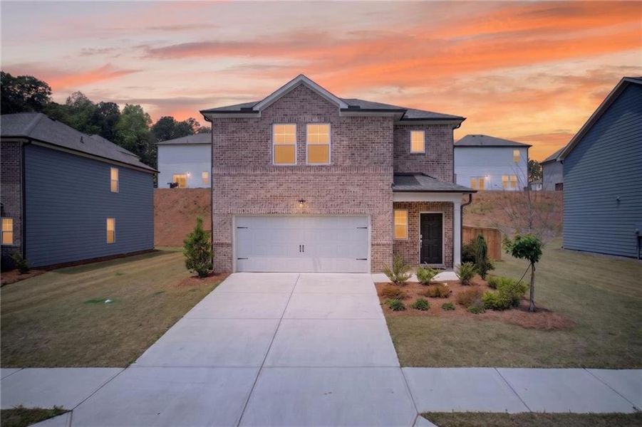 Front exterior of a new home in , Union City, GA, highlighting curb appeal (Image 2). Front exterior of a new home in , Union City, GA, highlighting curb appeal (Image 2).