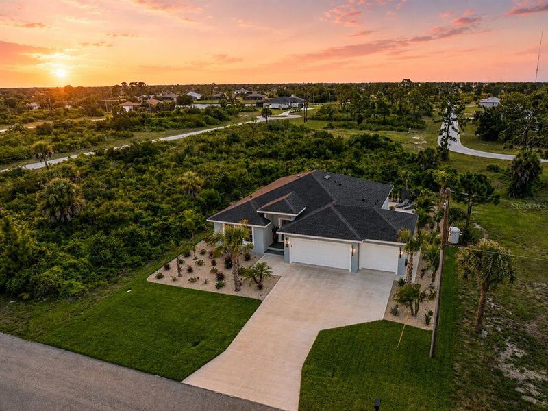 Front exterior of a new home in , Placida, FL, highlighting curb appeal (Image 30).