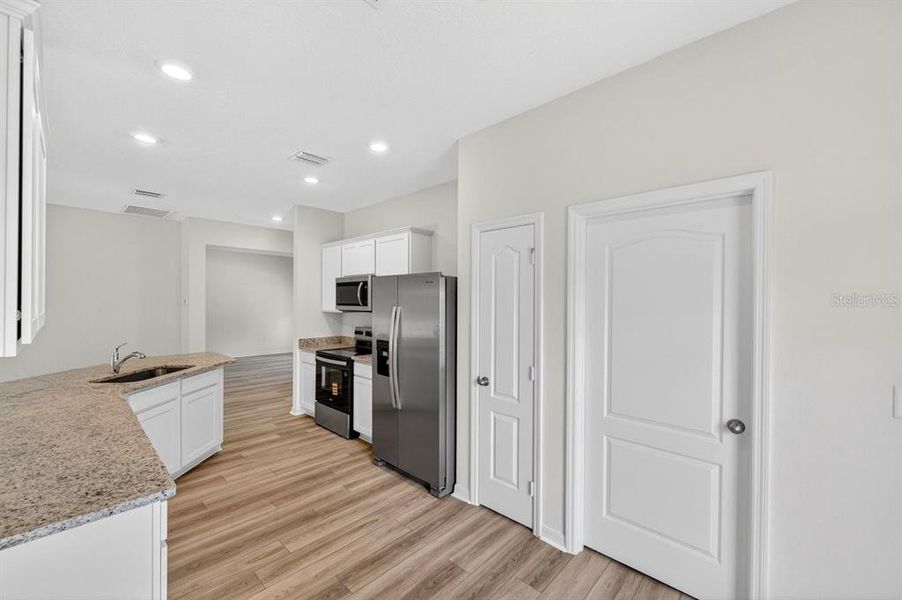 Furnished interior view inside a new home in , Deltona (Image 11).