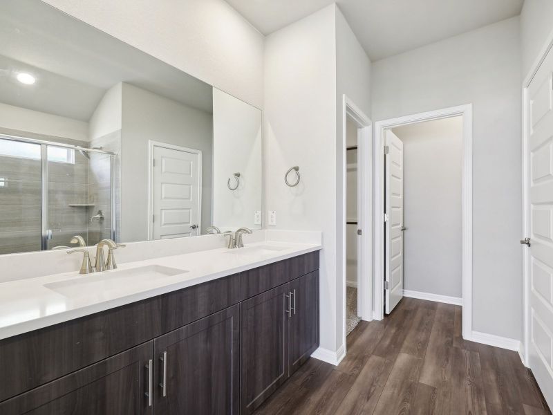 Furnished interior view inside a new home in Riverbend at Double Eagle - Boulevard Collection, Cedar Creek (Image 4).