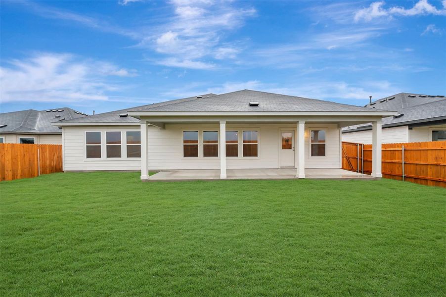 Exterior details and patio area of a home in Carillon, Manor (Image 4).