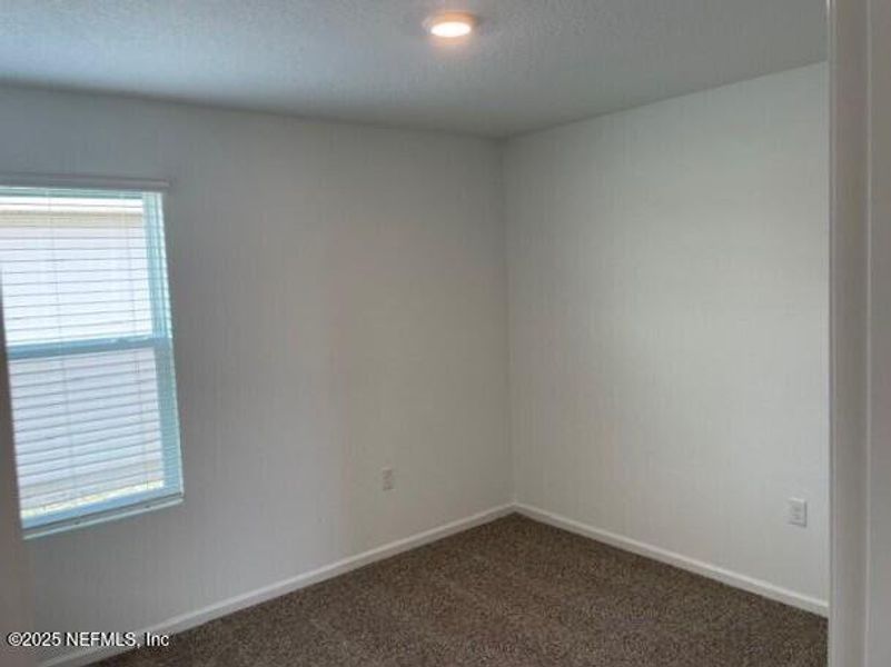 Spacious, unfurnished interior of a new home in The Arbors, Jacksonville (Image 19).