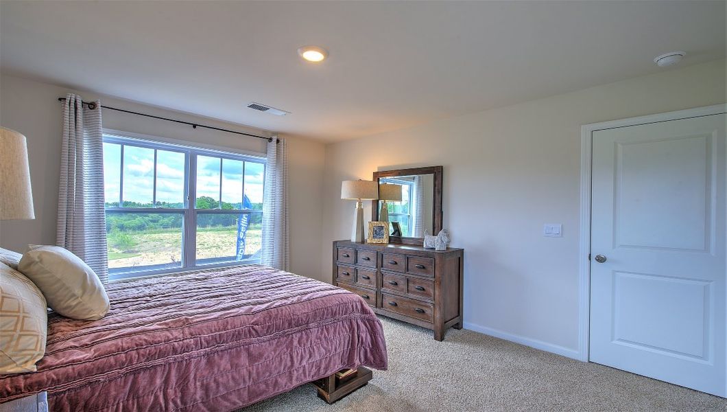 Furnished interior view inside a new home in Reserve at Tap Root Farms, Fletcher (Image 38). Furnished interior view inside a new home in Reserve at Tap Root Farms, Fletcher (Image 38).