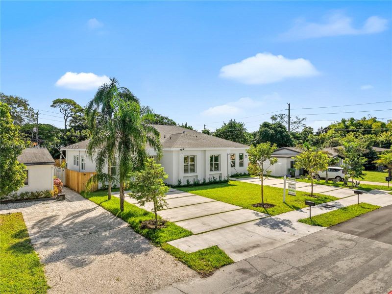 Front exterior of a new home in , Fort Lauderdale, FL, highlighting curb appeal (Image 2). Front exterior of a new home in , Fort Lauderdale, FL, highlighting curb appeal (Image 2).