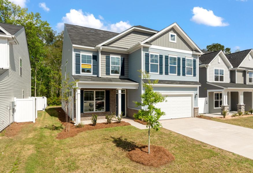 Front exterior of a new home in Parker's Preserve, Ridgeville, SC, highlighting curb appeal (Image 23).