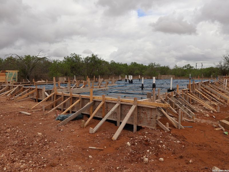 In-progress construction of a new home in Chaparral Ranch, Floresville, TX (Image 21).
