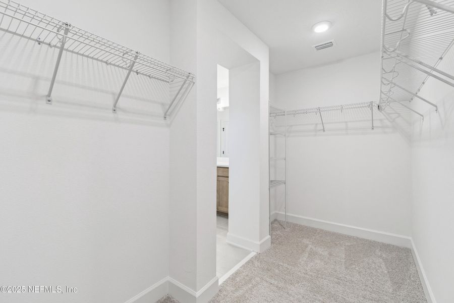 Spacious, unfurnished interior of a new home in Evergreen Island at Silverleaf - Classic, St. Augustine (Image 24).