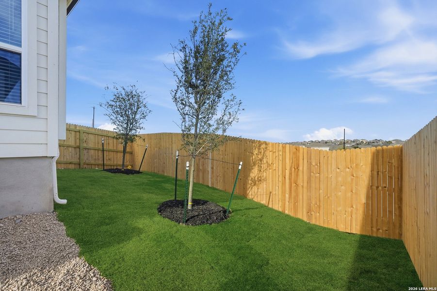 Exterior details and patio area of a home in Prominence, San Antonio (Image 3).