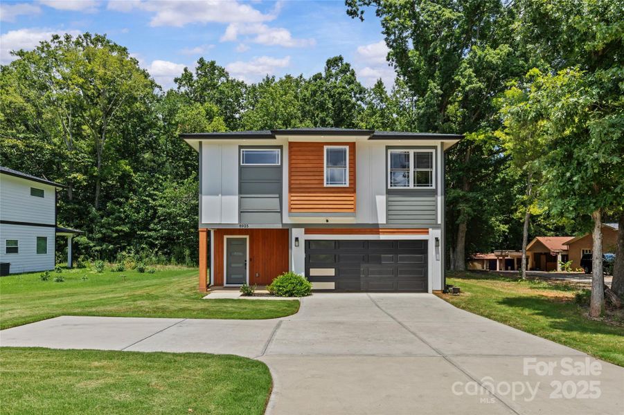 Front exterior of a new home in , Charlotte, NC, highlighting curb appeal (Image 22).