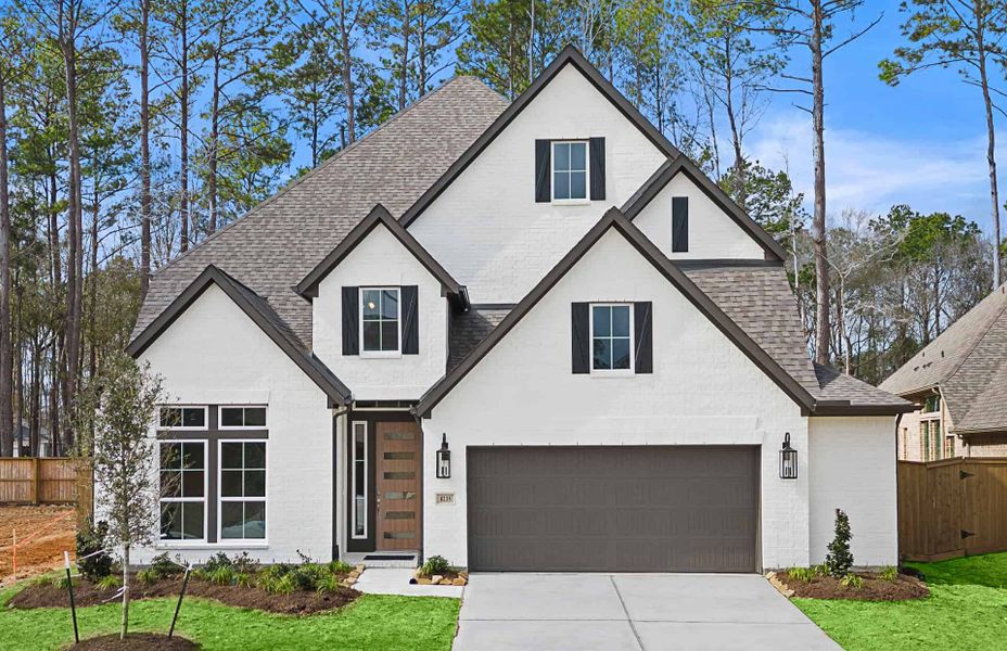 Representative exterior photo of a completed home built from the 3099 by Ravenna Homes in The Highlands 55′, Porter, TX (Image 1). Representative exterior photo of a completed home built from the 3099 by Ravenna Homes in The Highlands 55′, Porter, TX (Image 1).