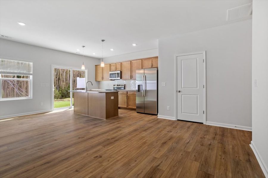 Furnished interior view inside a new home in West Main Townhomes, Sanford (Image 5).