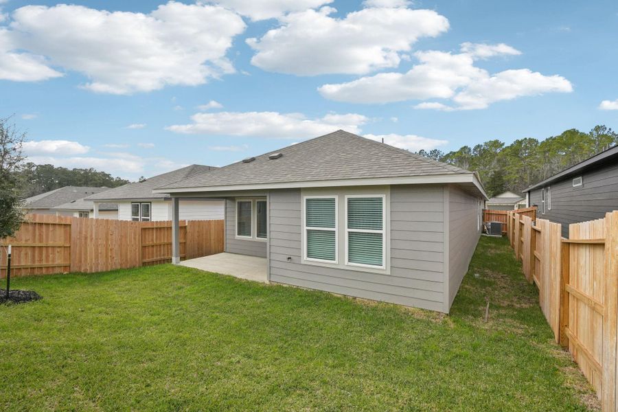 Exterior details and patio area of a home in Pine Lake Cove - Traditional Series, Montgomery (Image 23).