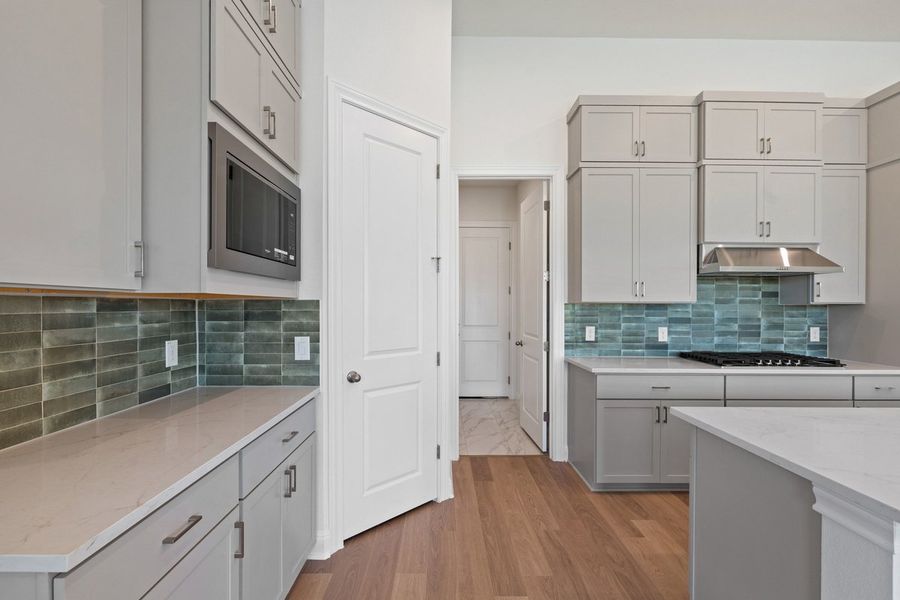 Furnished interior view inside a new home in Persimmon, Buda (Image 7).