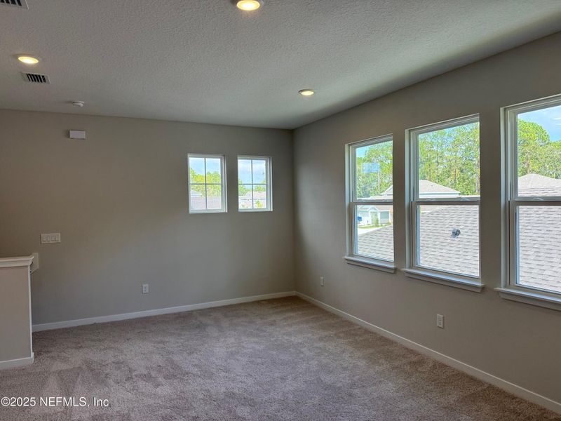 Spacious, unfurnished interior of a new home in The Preserve at Concourse Crossing, Fernandina Beach (Image 11).