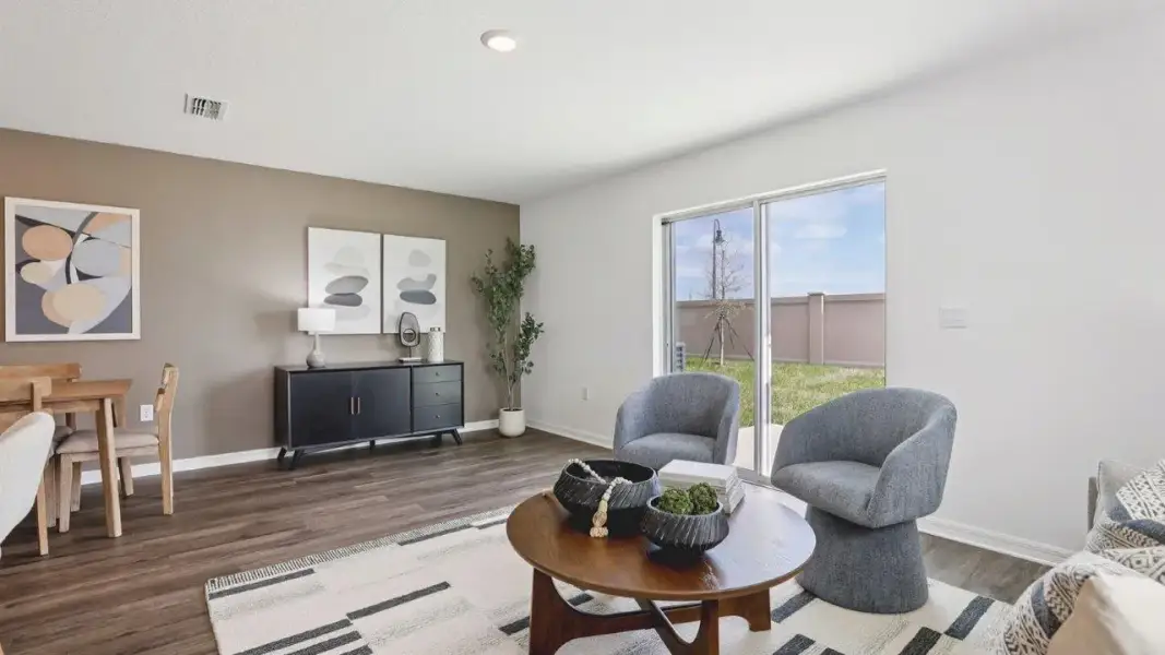 Furnished interior view inside a new home in Atria at Ridgewood Lakes, Davenport (Image 8).