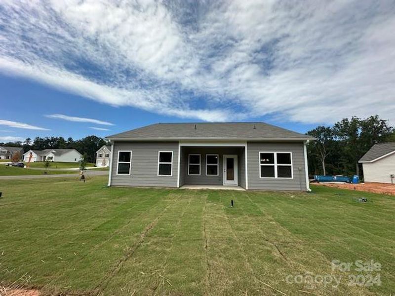 Back of House with Covered Patio