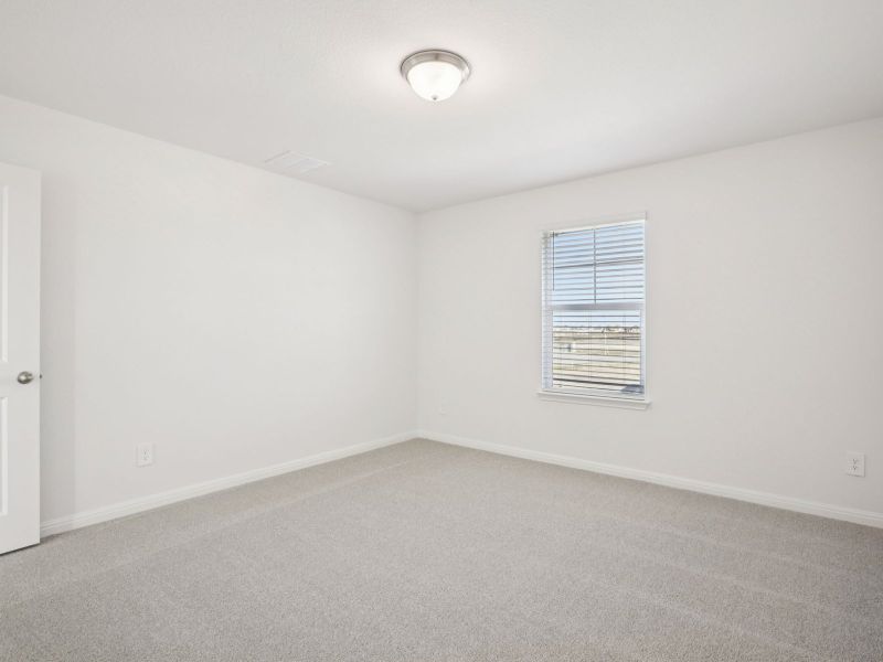 Spacious, unfurnished interior of a new home in Prairie Winds - Boulevard Collection, Hutto (Image 12).