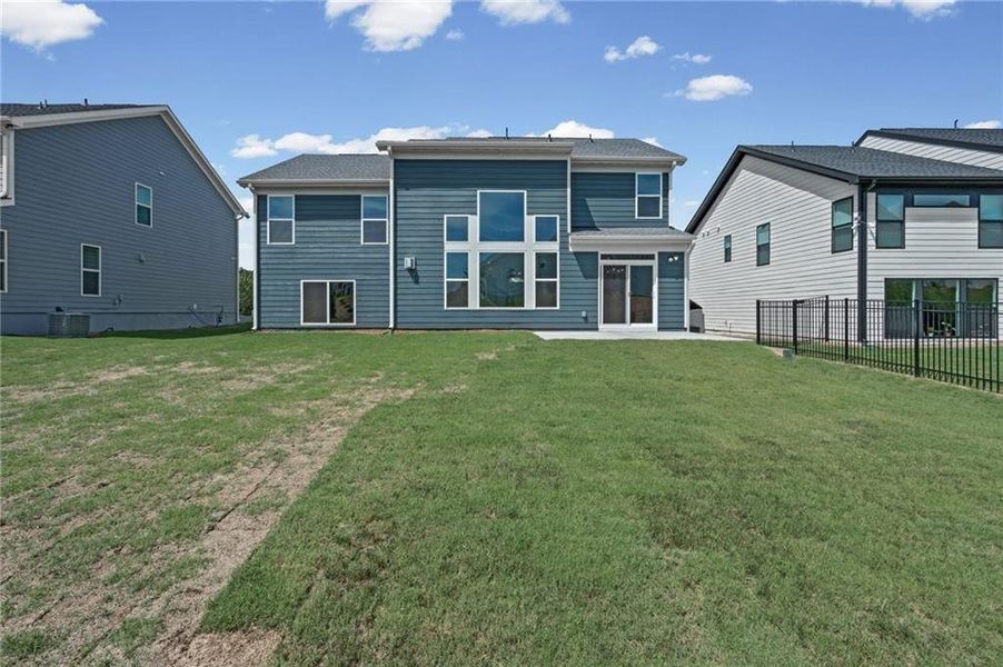 Exterior details and patio area of a home in Twin Lakes, Hoschton (Image 3).