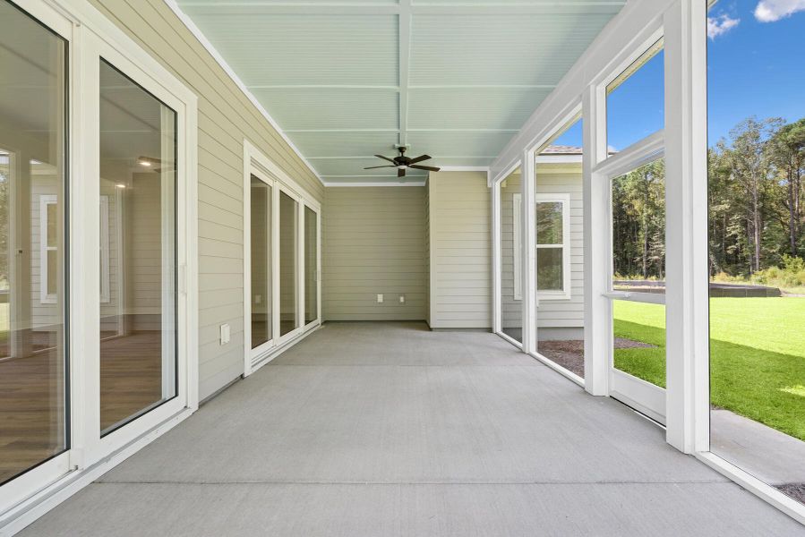 Exterior details and patio area of a home in Point Hope - Village Collection, Charleston (Image 3).