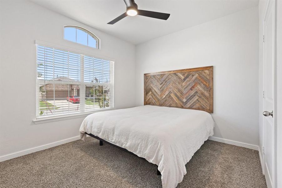 Bedroom #1 featuring carpet, baseboards, and a ceiling fan Bedroom #1 featuring carpet, baseboards, and a ceiling fan