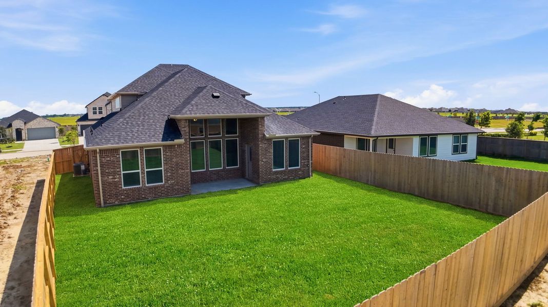 Exterior details and patio area of a home in Westland Ranch 50' Homesites, League City (Image 3).